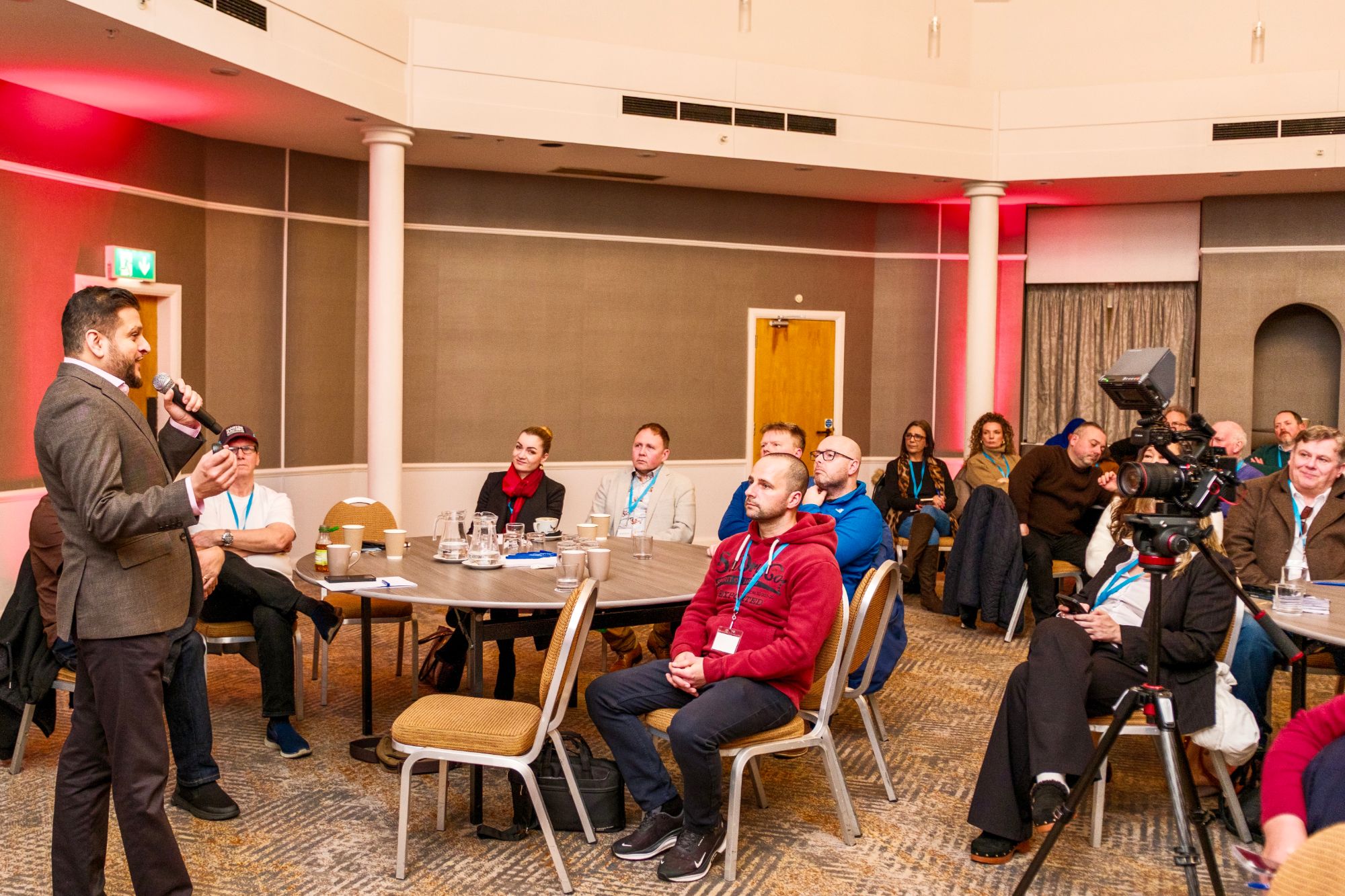 Faisal taking questions from business owners at a Progressive Business Network event